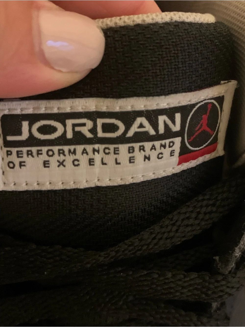 Jordan Black Sneakers with Red Jumpman Accent